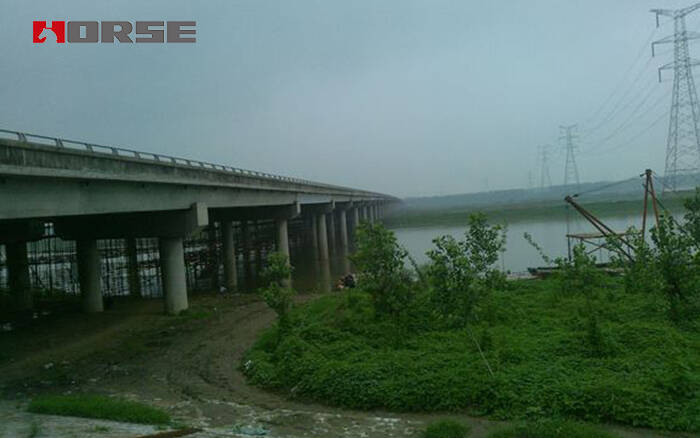Xinyi bridge reinforcement with steel plate and anchoring rebar Xinyi bridge reinforcement with steel plate and anchoring rebar