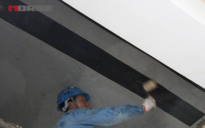 Slab crack repair with carbon fiber fabric Slab crack repair with carbon fiber fabric