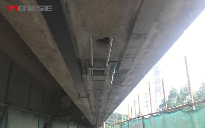 Prestressed FRP strip supporting bridge Prestressed FRP strip supporting bridge