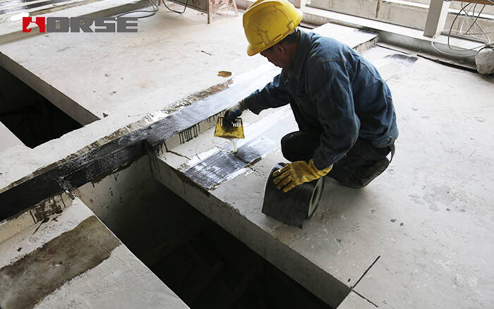 Repair and strengthening of reinforced concrete slab with carbon fiber reinforced polymer Repair and strengthening of reinforced concrete slab with carbon fiber reinforced polymer