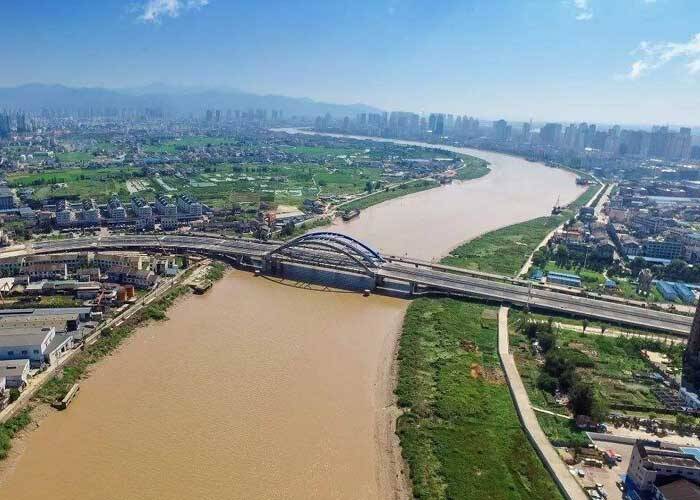 Maintenance and reinforcement of Longgang Bridge with CFRP Maintenance and reinforcement of Longgang Bridge with CFRP