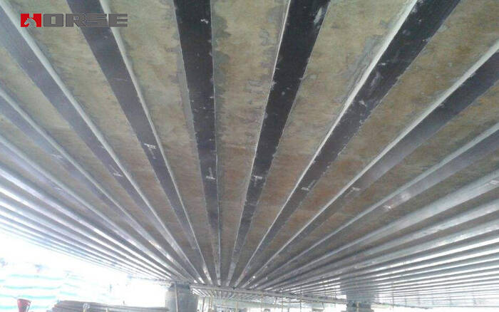 Bridge reinforcement by carbon fiber laminate Bridge reinforcement by carbon fiber laminate