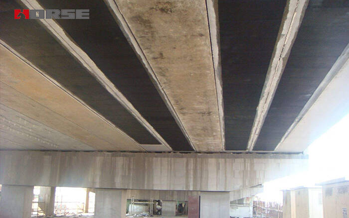 Cracked Bridge Rehabilitation with Carbon Fiber Wrapping System Cracked Bridge Rehabilitation with Carbon Fiber Wrapping System