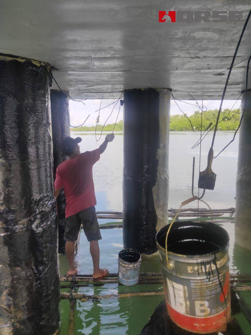 Jetty Repair With Carbon Fiber Sheet Jetty Repair With Carbon Fiber Sheet