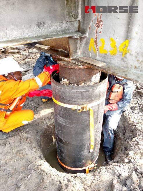 Rehabilitation of a Reinforced Concrete Jetty wIth CFRP Jacketing Rehabilitation of a Reinforced Concrete Jetty wIth CFRP Jacketing